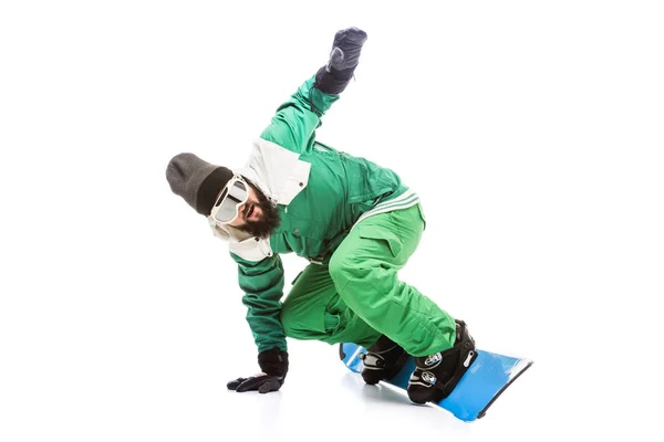 Hombre deslizándose sobre snowboard - foto de stock