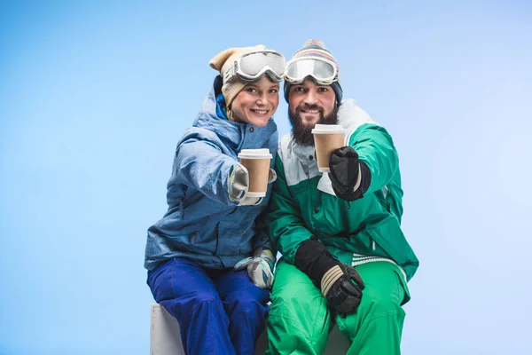 Snowboarders with coffee to go — Stock Photo