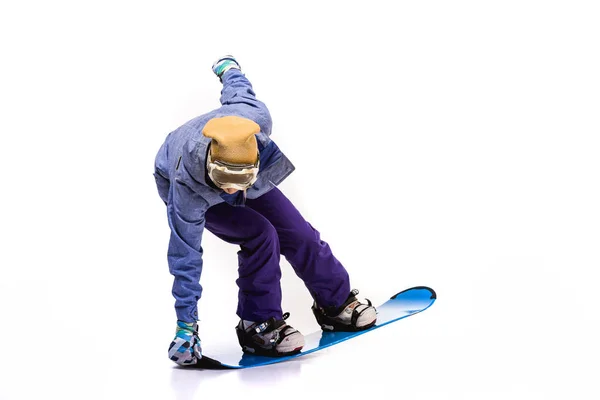 Frau rutscht auf Snowboard — Stockfoto