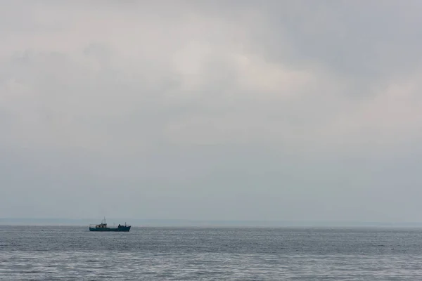 Lonely ship floating in sea — Stock Photo