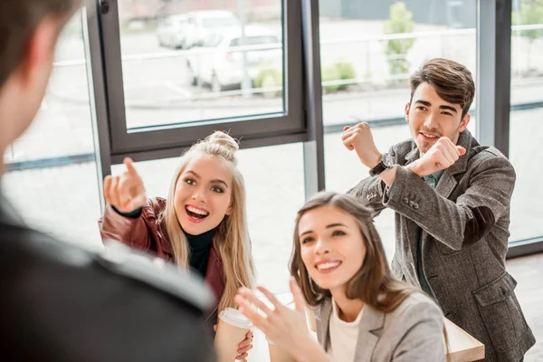 Friends showing different gestures — Stock Photo