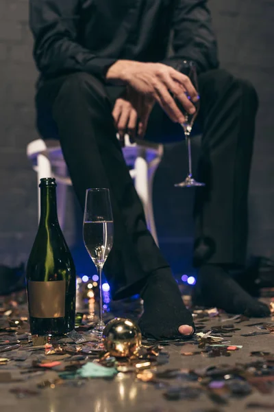Man with ripped sock at christmas party — Stock Photo