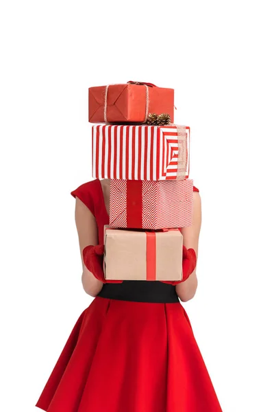 Woman holding christmas gifts — Stock Photo