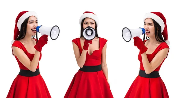 Asian woman in santa costume with loudspeaker — Stock Photo