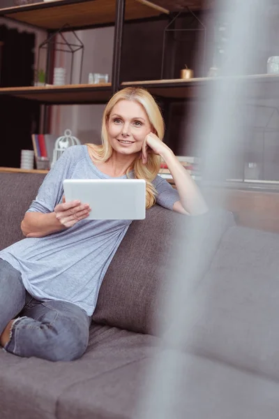 Woman with digital tablet at home — Stock Photo