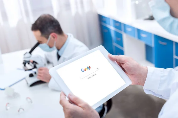 Scientist holding digital tablet — Stock Photo