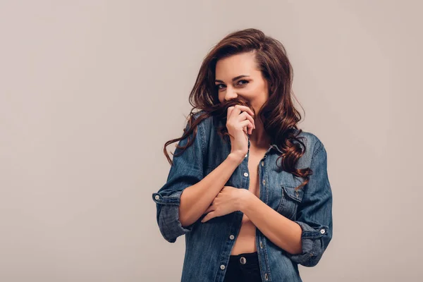 Seductive girl in denim shirt — Stock Photo