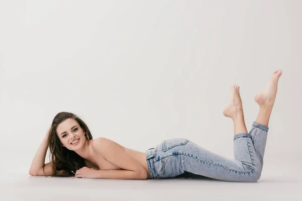 Topless girl in jeans — Stock Photo