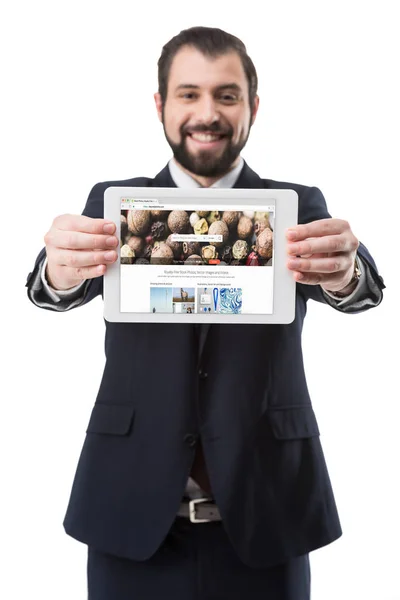 Tablet with depositphotos website — Stock Photo