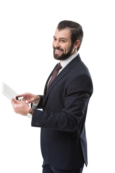 Homme d'affaires joyeux avec tablette — Photo de stock