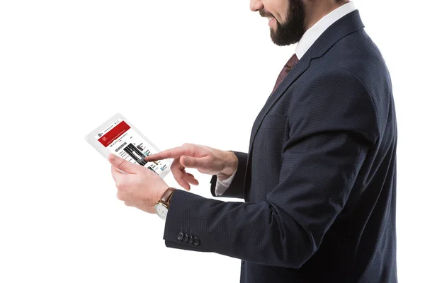 Businessman with tablet with bbc news — Stock Photo