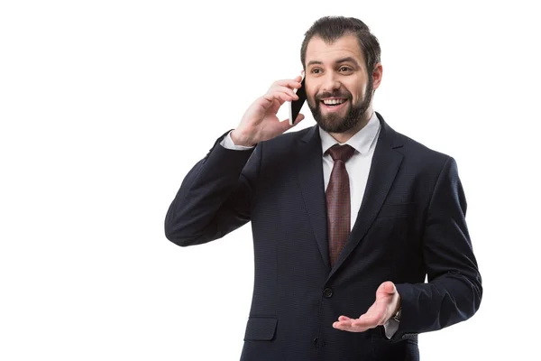 Businessman talking on smartphone — Stock Photo