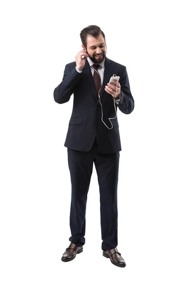 Businessman listening music — Stock Photo