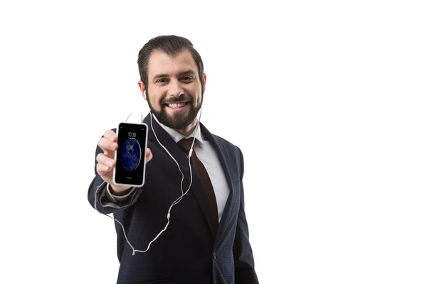 Businessman showing smartphone — Stock Photo