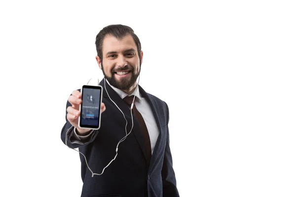 Homem de negócios mostrando smartphone com site — Fotografia de Stock