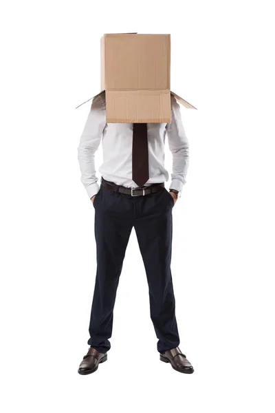 Serious businessman with box on head — Stock Photo