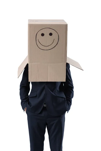 Бизнесмен с коробкой с улыбкой на голове — стоковое фото