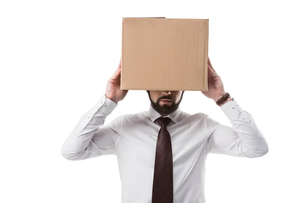 Businessman with box on head — Stock Photo