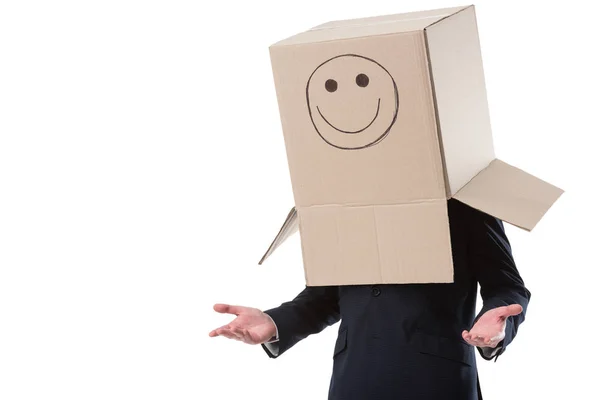 Businessman with box with smile sign — Stock Photo