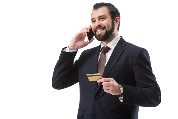 Homme d'affaires avec carte de crédit et smartphone — Photo de stock
