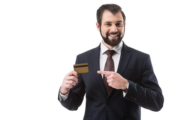 Businessman pointing at credit card — Stock Photo