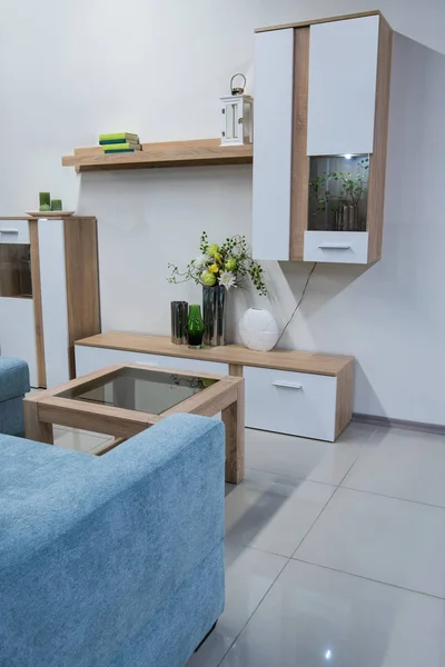 Modern living room interior with closet and shelves — Stock Photo