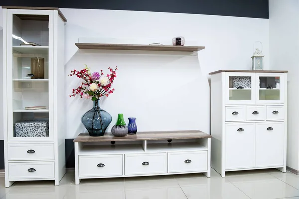 Modern living room interior with closet and shelves — Stock Photo