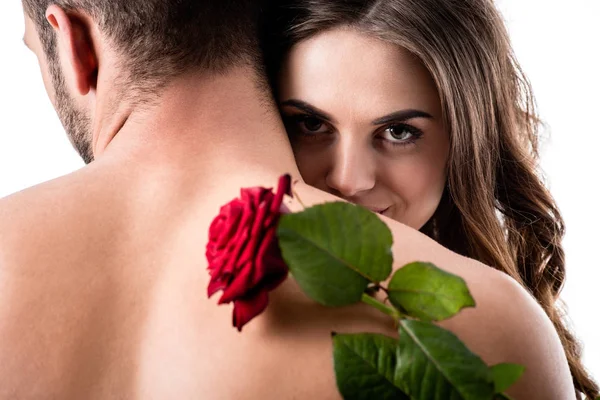 Acctractive sensual couple with rose isolated on white — Stock Photo