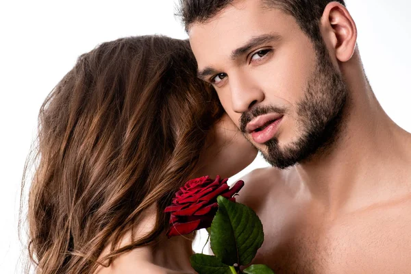 Acctractive sensual couple with rose isolated on white — Stock Photo