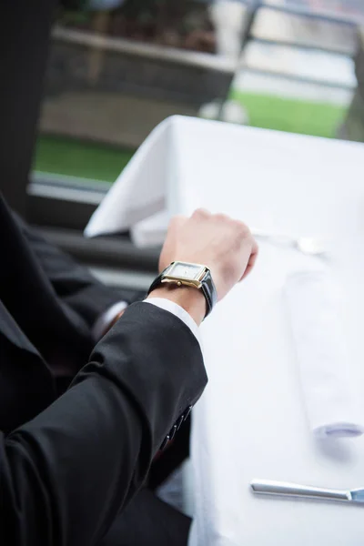 Close up view of stylish watch on male wrist — Stock Photo