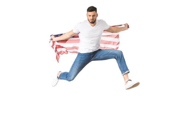 Schöner junger Mann mit amerikanischer Flagge und Springen isoliert auf weiß — Stockfoto