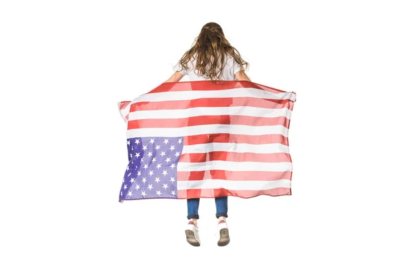 Vue arrière de la jeune femme tenant le drapeau américain isolé sur blanc — Photo de stock
