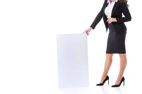 Cropped image of stewardess holding empty board isolated on white — Stock Photo