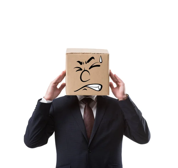 Businessman with cardboard box on head having headache isolated on white — Stock Photo