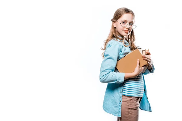 Beautiful teenage girl in eyeglasses holding books and smiling at camera isolated on white — Stock Photo