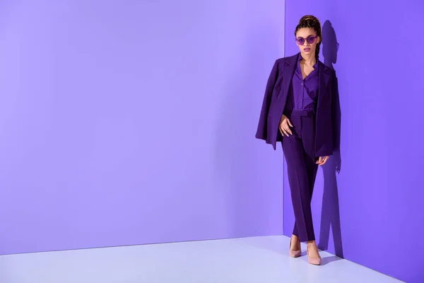 Fashionable african american girl posing in trendy purple suit, ultra violet trend — Stock Photo