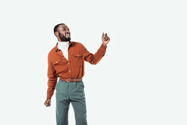 Happy african american retro styled man dancing isolated on white — Stock Photo