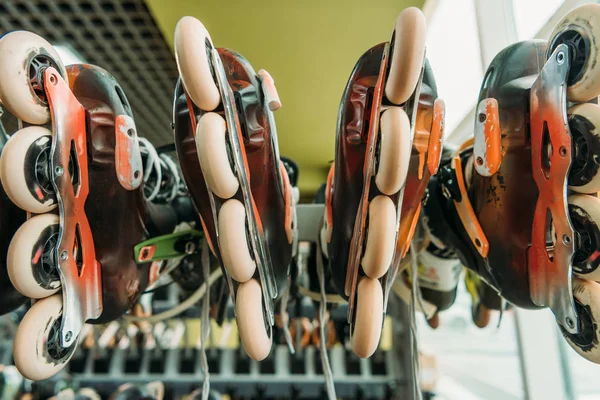 Close up view of arranged roller skates in indoors skate park — Stock Photo