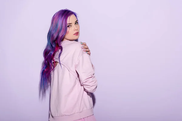 Sensual young woman with purple hair on pink — Stock Photo
