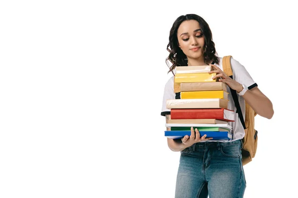 Afrikanisch-amerikanische Teenie-Studentin schaut sich Bücher isoliert auf weiß an — Stockfoto