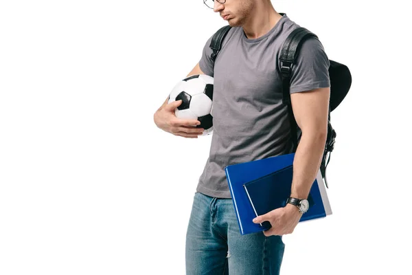 Imagem cortada de estudante segurando bola de futebol isolado em branco — Fotografia de Stock