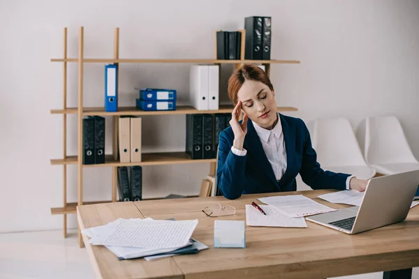 Overworked businesswoman — Stock Photo