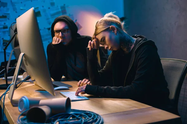 Depressed couple of hackers having problem with malware development — Stock Photo