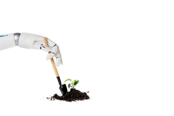 Abgeschnittene Aufnahme eines Roboters, der Erdhaufen mit kleinen Pflanzen schaufelt, isoliert auf weißem Grund — Stockfoto