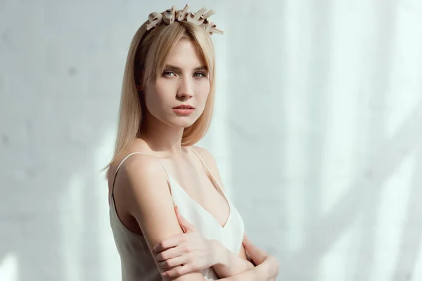 Thoughtful woman in dress with wreath made of fresh mushrooms on head, vegan lifestyle concept — Stock Photo