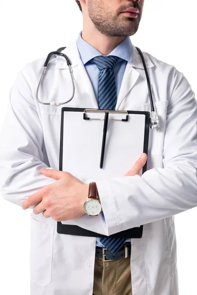 Close-up view of blank clipboard in hands of doctor wearing white coat with stethoscope isolated on white — Stock Photo