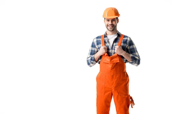 Reparador sorridente em laranja chapéu geral e duro isolado em branco — Fotografia de Stock