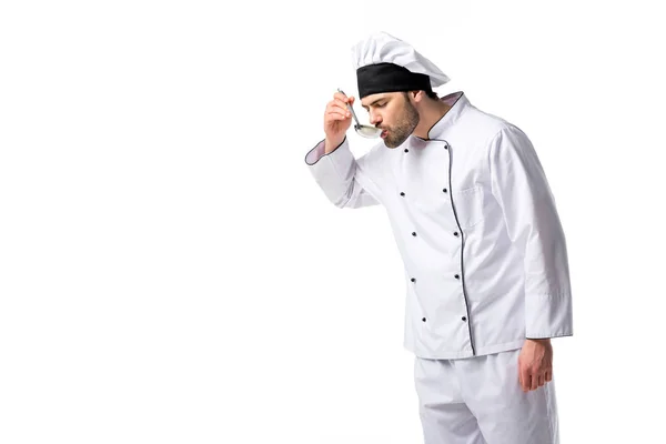 Portrait of chef with soup ladle in hand isolated on white — Stock Photo