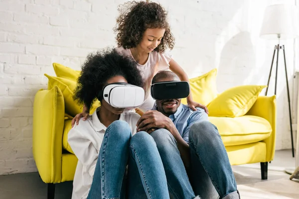 African american in virtual reality headset having fun together at home — Stock Photo