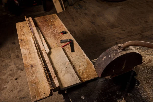 High angle view of working table and machine saw at sawmill — Stock Photo